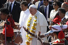 Pope Francis walks with President Maithripala Sirisena as the pontiff arrives at the international airport in Colombo, Sri Lanka, Jan. 13. (CNS photo/Paul Haring)