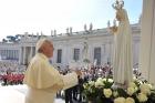 Pope Francis prays in front of a statue of Our Lady of Fatima during his general audience in St. Peter's Square. (CNS photo/L'Osservatore Romano, pool)
