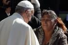 Pope Francis greets woman at Palmasola prison in Santa Cruz, Bolivia, July 10. (CNS photo/Paul Haring) 