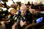 Italian journalist Gianluigi Nuzzi is surrounded by the media after a Nov. 4 news conference for his new book "Merchants in the Temple: Inside Pope Francis' Secret Battle Against Corruption in the Vatican." (CNS photo/Yara Nardi, Reuters)