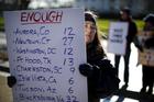 A Grim Tally. Gun control activists rally in front of the White House in Washington on Jan. 4. The next day, President Barack Obama announced executive actions to reduce gun violence. 