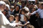 Pope Francis visiting a refugee camp on the island of Lesbos, Greece in 2016. (CNS photo/Paul Haring)