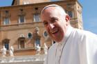 Pope Francis smiles as he arrives to lead his general audience in St. Peter's Square at the Vatican on May 18. (CNS photo/Paul Haring)