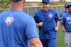 Father Burke Masters, Chicago Cubs' chaplain, takes part in a practice with players during spring training in March 2016 at Sloan Park in Mesa, Ariz. Cubs Manager Joe Maddon invited Father Masters to practice with the team. (CNS photo/Ed Mailliard, courtesy Topps) 