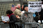 A woman prays during a pro-life demonstration outside the Planned Parenthood-Margaret Sanger Health Center in New York City Feb. 11. (CNS photo/Andrew Kelly, Reuters)