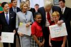 U.S. President Donald Trump chats with students from St. Andrew Catholic School in Orlando, Fla., on March 3. U.S. Sen. Marco Rubio, R-Fla., and U.S. Education Secretary Betsy DeVos also joined the president. (CNS photo/Jonathan Ernst, Reuters)