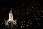 A statue of Mary is carried through the crowd in 2013 at the Marian shrine of Fatima in central Portugal. (CNS photo/Paulo Cunha, EPA)