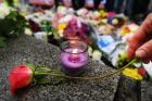 A floral tribute is seen during a vigil outside City Hall in London on June 5. (CNS photo/Andy Rain, EPA)