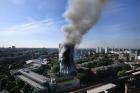 Flames and smoke billow from a London apartment building on June 14. London's Metropolitan Police said a number of people were being treated for a range of injuries, and authorities appealed for families to report anyone unaccounted for. (CNS photo/Andy Rain, EPA) 