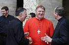 Cardinal Joseph W. Tobin of Newark, N.J., center, talks with Bishop James F. Checchio of Metuchen, N.J., left, and U.S. Archbishop James P. Green, in Rome in June 2017. (CNS photo/Paul Haring) 