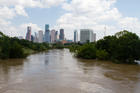 Buffalo Bayou floods past its banks near downtown Houston on Aug. 31, 2017, after Hurricane Harvey hit Texas with 4.5 feet of rain. (CNS photo/James Ramos, Texas Catholic Herald)