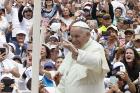  Pope Francis greets the crowd before celebrating Mass at Enrique Olaya Herrera Airport in Medellin, Colombia, Sept. 9. (CNS photo/Paul Haring) 