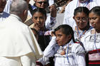 A girl cries as Pope Francis meets a group from Mexico during his general audience in St. Peter's Square at the Vatican on Sept. 20. Mexico was hit by a 7.1 magnitude earthquake on September 19th. (CNS photo/Paul Haring)