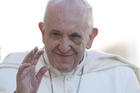 Pope Francis arrives to lead his general audience in St. Peter's Square at the Vatican Sept. 20.