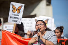 Rosa B., 23, a recipient of the Deferred Action for Childhood Arrivals program, who was brought to the U.S. when she was 4, speaks during a Feb. 3 rally in Los Angeles in support of a permanent legislative solution for immigrants. Cardinal Joseph W. Tobin of Newark, N.J., says religious leaders need to stand with immigrants and help the flock see their dignity. (CNS photo/Monica Almeida, Reuters)