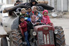 RESIDENTS FLEE SYRIAN VILLAGE