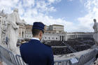 A Vatican police officer at St. Peter's Square during Easter Mass, April 1. (CNS photo/Paul Haring)