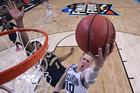 Michigan Wolverines guard Charles Matthews tries to defend a shot from Villanova Wildcats guard Donte DiVincenzo in the N.C.A.A. men’s basketball championship on April 2, 2018, in San Antonio. Villanova won its second championship in three years. (CNS photo/ Robert Deutsch, USA TODAY Sports via Reuters)
