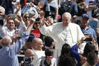  Pope Francis greets the crowd after celebrating Mass marking the feast of Divine Mercy in St. Peter's Square at the Vatican April 8. (CNS photo/Paul Haring)