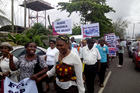 Nigerians carry placards during a May 22 protest in Lagos against the killing of innocent citizens, presumably by herdsmen, in some parts of the country. Catholics marched in various cities around the country. (CNS photo/Peter Dada)