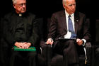 Edward Reese, S.J., president of St. Ignatius College Prep in San Francisco, and former Vice President Joe Biden, listen to speakers during a memorial service for U.S. Sen. John McCain, R-Ariz., at North Phoenix Baptist Church. (CNS photo/Matt York, Pool via Reuters)