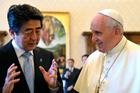Japanese Prime Minister Shinzo Abe gestures next to Pope Francis during a 2014 private audience at the Vatican. (CNS photo/Alberto Pizzoli, Pool via Reuters)