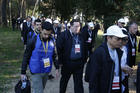 Cardinal Gerald C. Lacroix of Quebec, center, participate in a pilgrimage hike from the Monte Mario nature reserve in Rome to St. Peter's Basilica at the Vatican Oct. 25. Participants in the Synod of Bishops on young people, the faith and vocational discernment, and young people from Rome parishes took part in the hike. (CNS photo/Paul Haring)