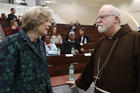 Sheila Hollins, a member of the Pontifical Commission for the Protection of Minors, talks with U.S. Cardinal Sean P. O'Malley, president of the commission, at a 2017 seminar in Rome on safeguarding children. (CNS photo/Paul Haring)