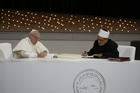 Pope Francis and Sheik Ahmad el-Tayeb, grand imam of Egypt's al-Azhar mosque and university, sign documents during an interreligious meeting at the Founder's Memorial in Abu Dhabi, United Arab Emirates, on Feb. 4, 2019. (CNS photo/Paul Haring) 