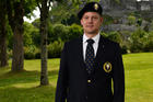 A member of the Knights of Columbus is shown sporting the Knights new uniform.