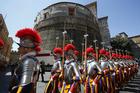 Recruits of the Vatican's Swiss Guard march in front of the tower of the Institute for Works of Religion in 2014. (CNS photo/Tony Gentile, Reuters)