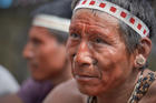 His face painted red with urucum, a man participates in a march by indigenous people through the streets of Atalaia do Norte in Brazil's Amazon region on March 27, 2019. Indigenous were protesting a central government plan to turn control of health care over to municipalities, in effect destroying a federal program of indigenous health care. (CNS photo/Paul Jeffrey) 