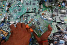 A man in Karachi, Pakistan, retrieves circuit boards from discarded computer monitors Aug. 16, 2017. An economic system lacking any ethics leads to a "throwaway" culture of consumption and waste, Pope Francis said in a speech addressed to members of the Council for Inclusive Capitalism during an audience at the Vatican Nov. 11. (CNS photo/Akhtar Soomro, Reuters) 