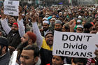 Demonstrators in Delhi, India, protest a new citizenship law on Dec. 27, 2019. Opponents say new law targets Muslim refugees, unlike people of other faiths. (CNS photo/Anushree Fadnavis, Reuters)