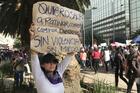 Joanely Martinez displays a sign—"I want to go out...to run, to walk, to enjoy myself without violence, without fear"—during the women's march on March 8, 2020, in Mexico City. She said the government "does nothing" to protect women, who are demanding the authorities do more to stop the murder of women and girls. (CNS photo/David Agren)