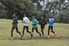 Young athletes in Kenya run during a recent training session in a field in the town of Iten. Irish Patrician Brother Colm O'Connell has been turning youths like these into Olympic and world champions. (CNS photo/Fredrick Nzwili)