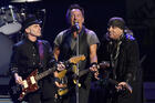 Bruce Springsteen performs with Nils Lofgren, left, and Steven Van Zandt of the E Street Band during their concert at the Los Angeles Sports Arena in Los Angeles, March 15, 2016. (Photo by Chris Pizzello/Invision/AP, File)