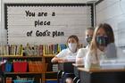 Sixth-graders sit at their desks on the first day of classes of the new academic year at Our Lady of Victory School in Floral Park, N.Y., on Sept. 8. (CNS photo/Gregory A. Shemitz)