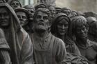 The sculpture "Angels Unawares" is seen at The Catholic University of America in Washington on Sept. 27, before touring the United States over the next year. The life-size sculpture, which depicts a group of migrants and refugees crowded on a boat, is a replica of the one Pope Francis unveiled in St. Peter’s Square at the Vatican during the 2019 World Day of Migrants and Refugees. (CNS photo/Tyler Orsburn)