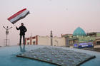 A man celebrates in Tehran, Iran, on Jan. 8, 2020, after the country launched missiles at U.S.-led forces in Iraq. (CNS photo/Nazanin Tabatabaee, West Asia News Agency via Reuters)