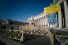 Several visitors enter an empty security queue before visiting St. Peter's Basilica at the Vatican on March 4. Visitors and pilgrims to churches, museums and landmarks in Rome have sharply declined following an outbreak of the COVID-19 coronavirus in northern Italy. (CNS photo/Junno Arocho Esteves)