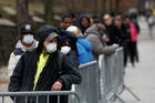 People at the Brooklyn Hospital Center in Brooklyn, N.Y., form a queue to enter a tent erected to test for coronavirus March 19, 2020. (CNS photo/Andrew Kelly, Reuters)