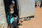 Displaced Syrian children are seen at a camp in Idlib on April 14, during the COVID-19 pandemic. Internally displaced people, those forced to flee their homes, but who do not cross into another country, still often need protection and special assistance, including from the church, said a new Vatican document released May 5. (CNS photo/Khalil Ashawi, Reuters)