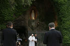 Pope Francis prays after leading the recitation of the rosary during a prayer service at the Lourdes grotto in the Vatican Gardens on May 30. (CNS photo/Paul Haring)