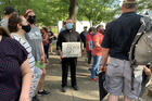 Father Joshua Laws, pastor of the Catholic Community of South Baltimore, participates in an interfaith prayer vigil against racism on June 3 in Baltimore. (CNS photo/Tim Swift, Catholic Review)