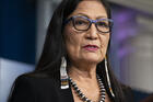 In this April 23, 2021, file photo, Interior Secretary Deb Haaland speaks during a news briefing at the White House in Washington. On Tuesday, June 22, 2021, Haaland and other federal officials are expected to announce steps that the federal government plans to take to reconcile the legacy of boarding school policies on Indigenous families and communities across the U.S. (AP Photo/Evan Vucci, File)