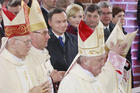 In this file photo taken on April 14, 2017, Polish bishops walk by President Andrzej Duda, First Lady Agata Kornhauser-Duda, parliament speakers and Prime Minister Beata Szydlo as they arrive to celebrate a special Mass during ceremonies marking 1,050 years of the nation's Catholicism at the 10th-century cathedral in Gniezno,Poland considered to be the cradle of Poland's Catholic faith. (AP Photo/Czarek Sokolowski)