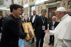 Pope Francis meets participants in the International symposium on a nuclear-weapons-free world, at the Vatican, Friday, Nov. 10, 2017. (L'Osservatore Romano/Pool Photo via AP)