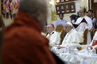 Pope Francis listens as Bhaddanta Kumarabhivamsa, Chairman of State of the Sangha Maha Nayaka Committee, delivers his speech, during a meeting with members of the Sangha Maha Nayaka supreme council of Buddhist monks, at the Kaba Aye pagoda, Yangon, Myanmar, Wednesday, Nov. 29, 2017. The pontiff is in Myanmar for the first stage of a week-long visit that will also take him to neighboring Bangladesh. (AP Photo/Andrew Medichini)