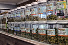 Jars of medical marijuana on display on at the Western Caregivers Medical dispensary in Los Angeles. (AP Photo/Richard Vogel, File)